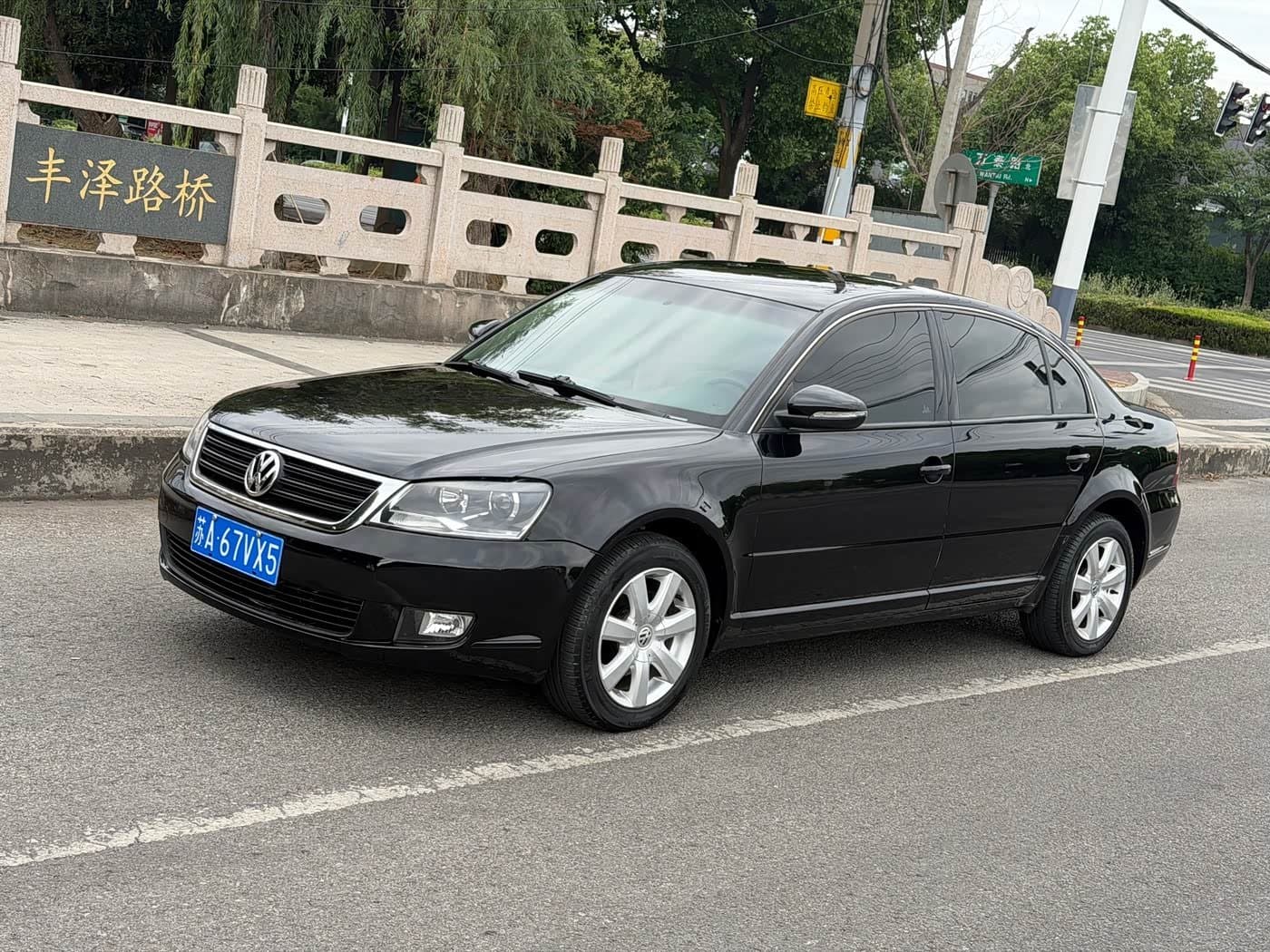 2009 Volkswagen Passat Lingyu Black, 61,000 km, China export – photo 1